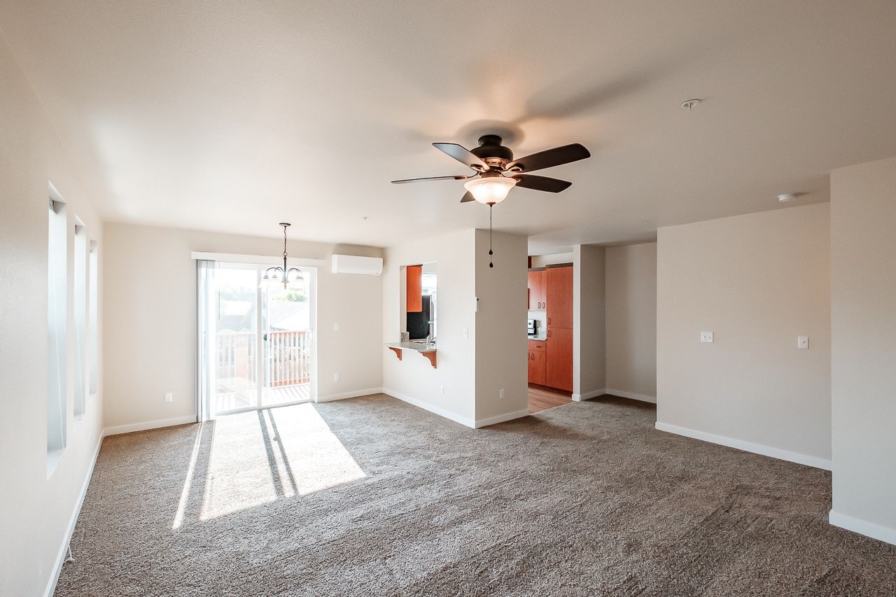 Goodnight Townhomes in Corvallis, OR, Near Oregon State University, four-bed, three-bath – dining room, sliding glass doors.