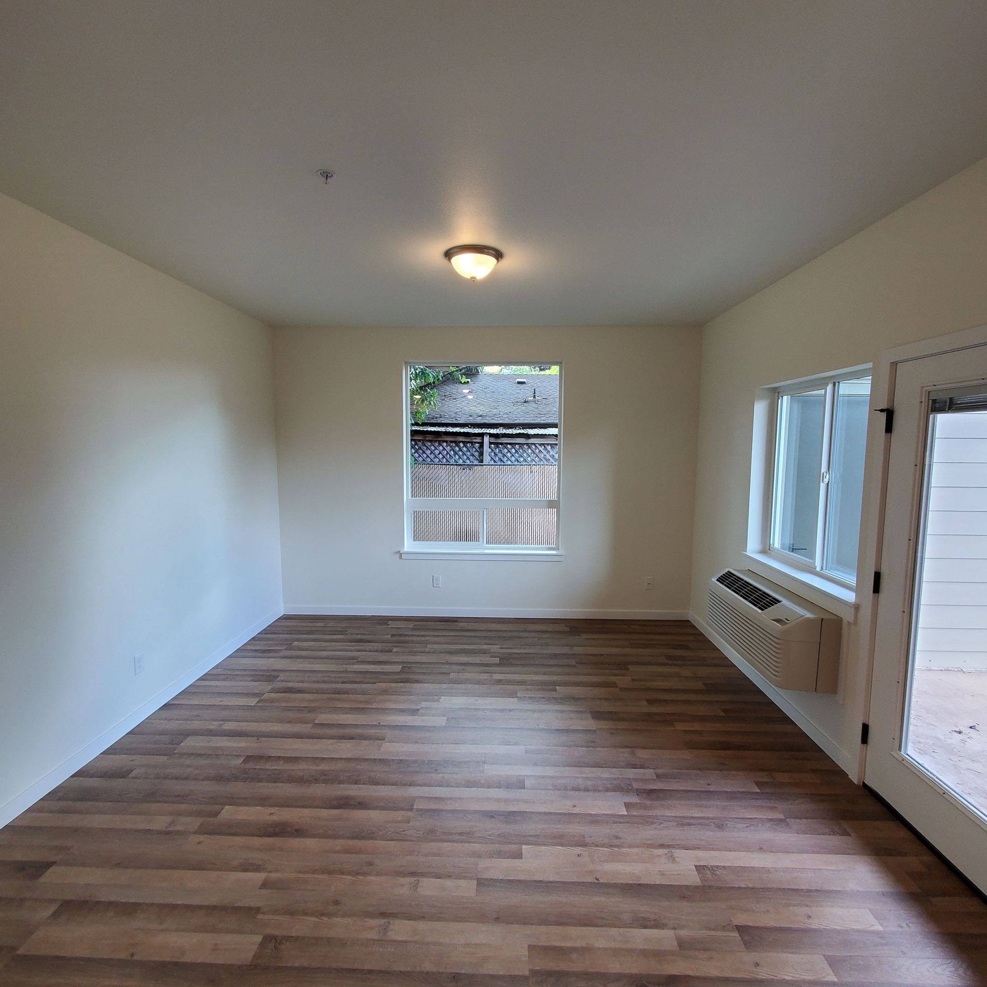 Oregon, near Western University of Health Sciences, one-bedroom one-bathroom –Living room front window.