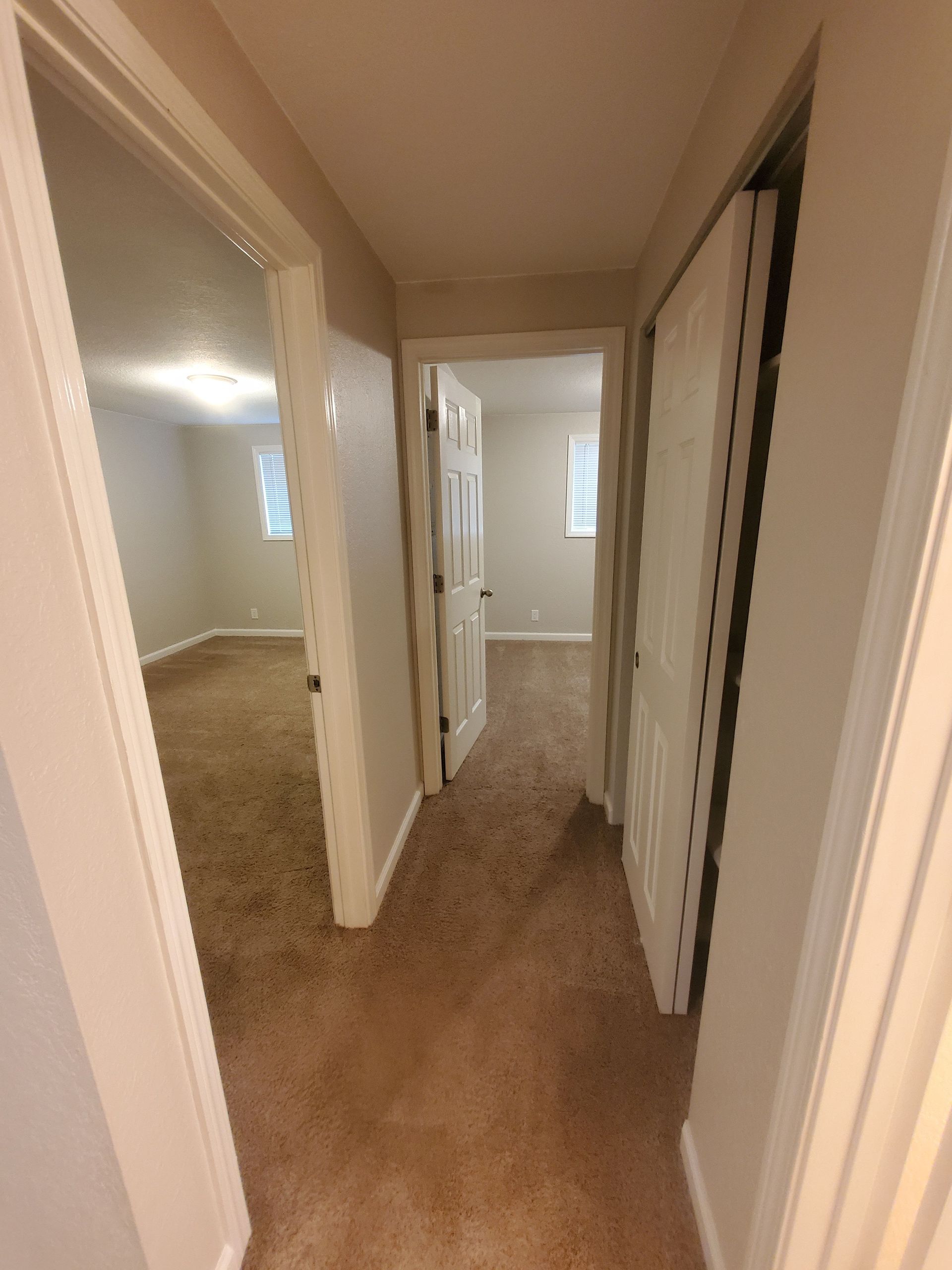 Jackson Duplexes in Albany Oregon – two bedroom one-bathroom – bedroom and hallway. 