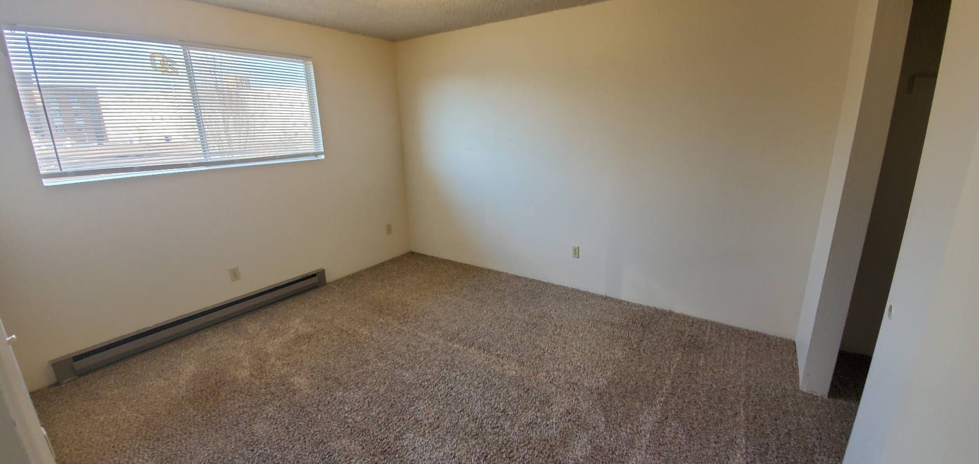 1061 Washington Apartments in Corvallis OR, Near Oregon State University, two-bedroom two-bathroom – living room, heater.