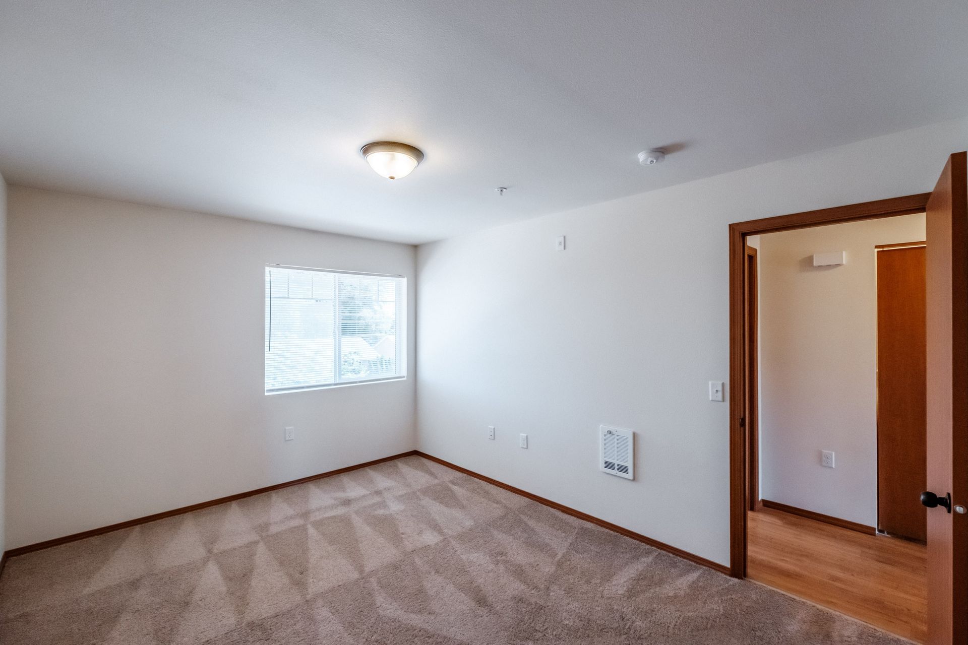 Newcastle Place Apartments in Salem, OR Near Chemeketa Community College, two-bedroom, two-bath– master bathroom and hallway.