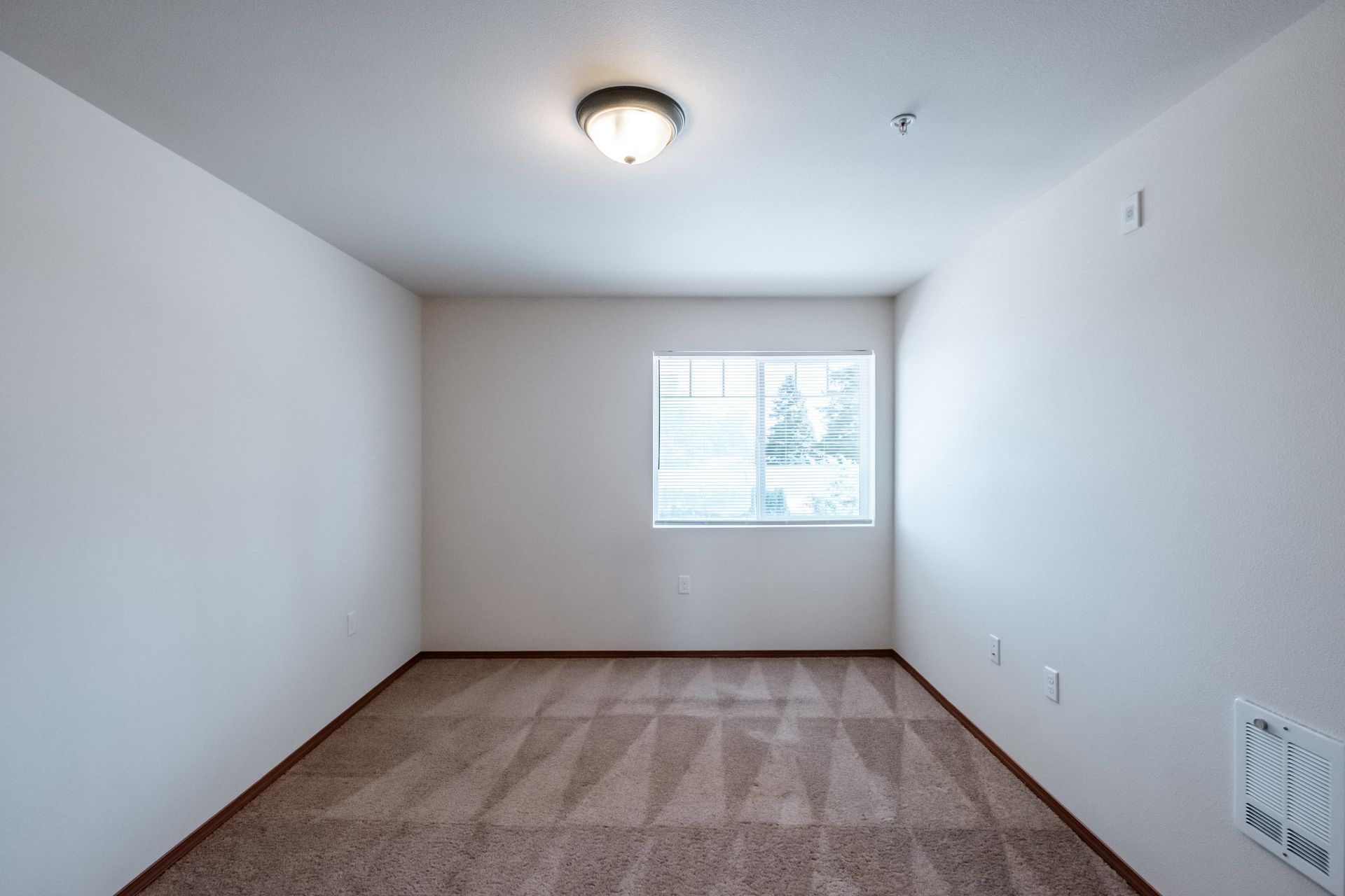 Newcastle Place Apartments in Salem, OR Near Chemeketa Community College, two-bedroom, two-bath–bathroom window.