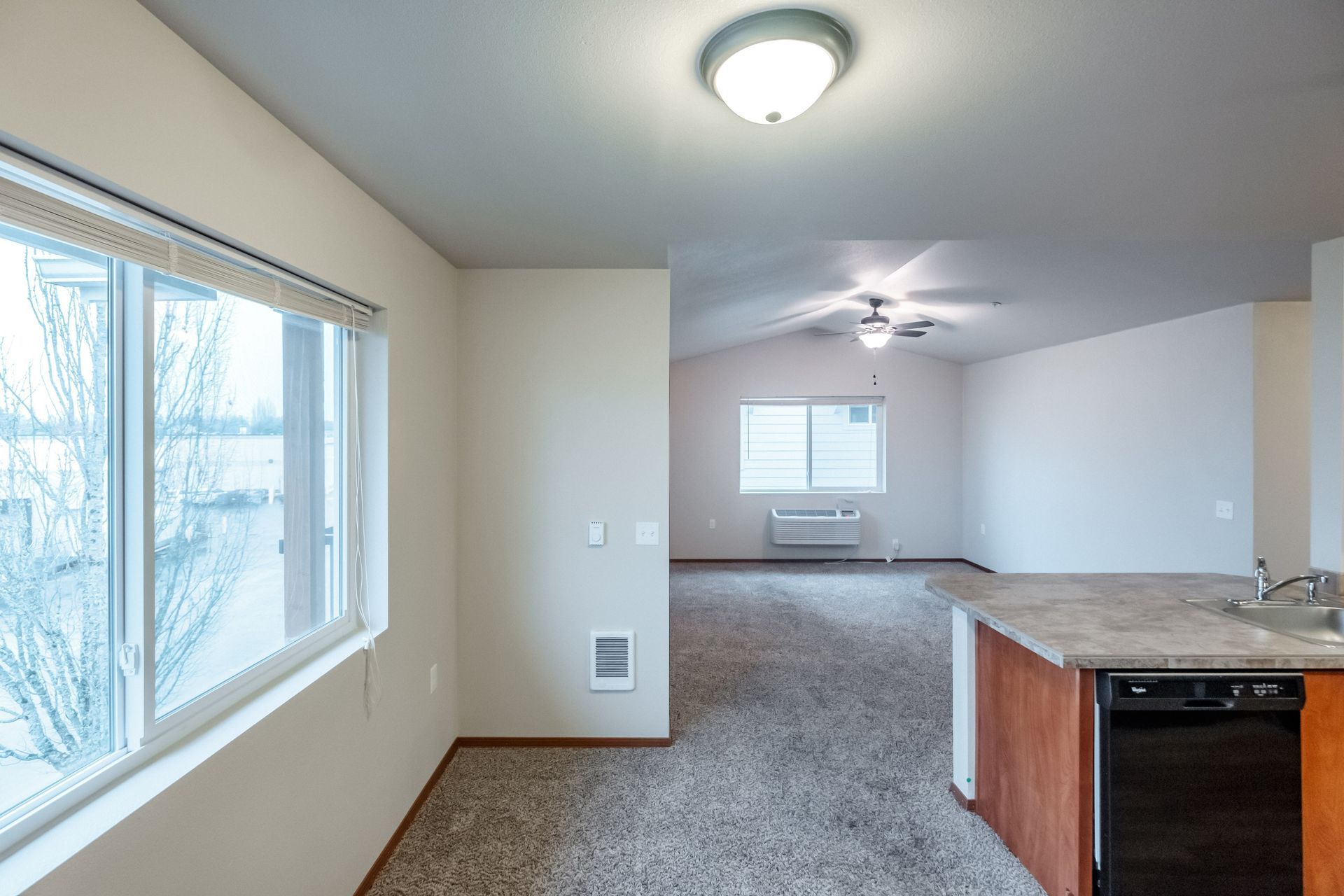 Lafayette Place Apartments in McMinnville, Oregon, near Linfield University – two-bedroom two-bath – living room from kitchen