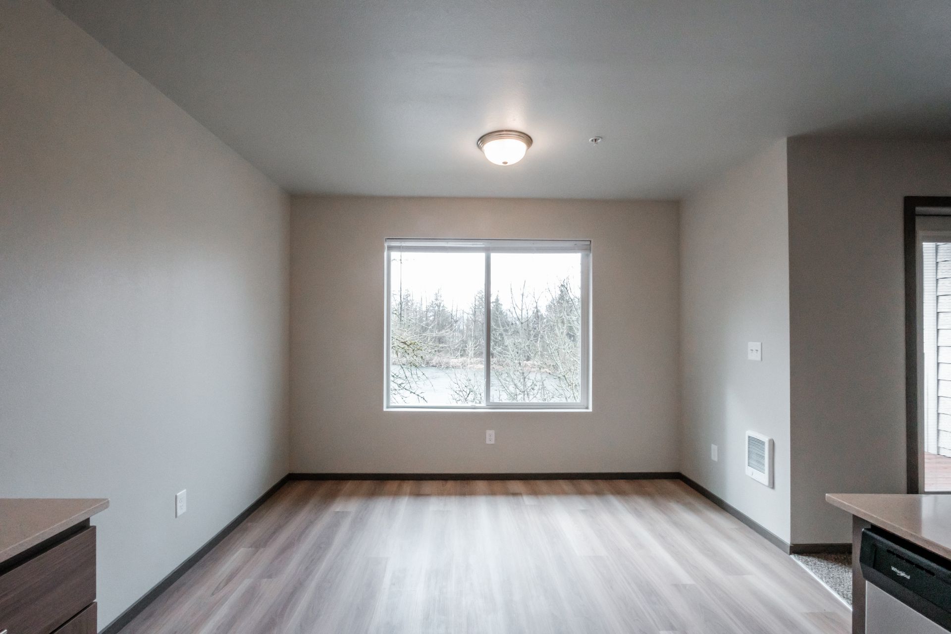 Jefferson Terrace Apartments in Jefferson Oregon – dining room with large window.