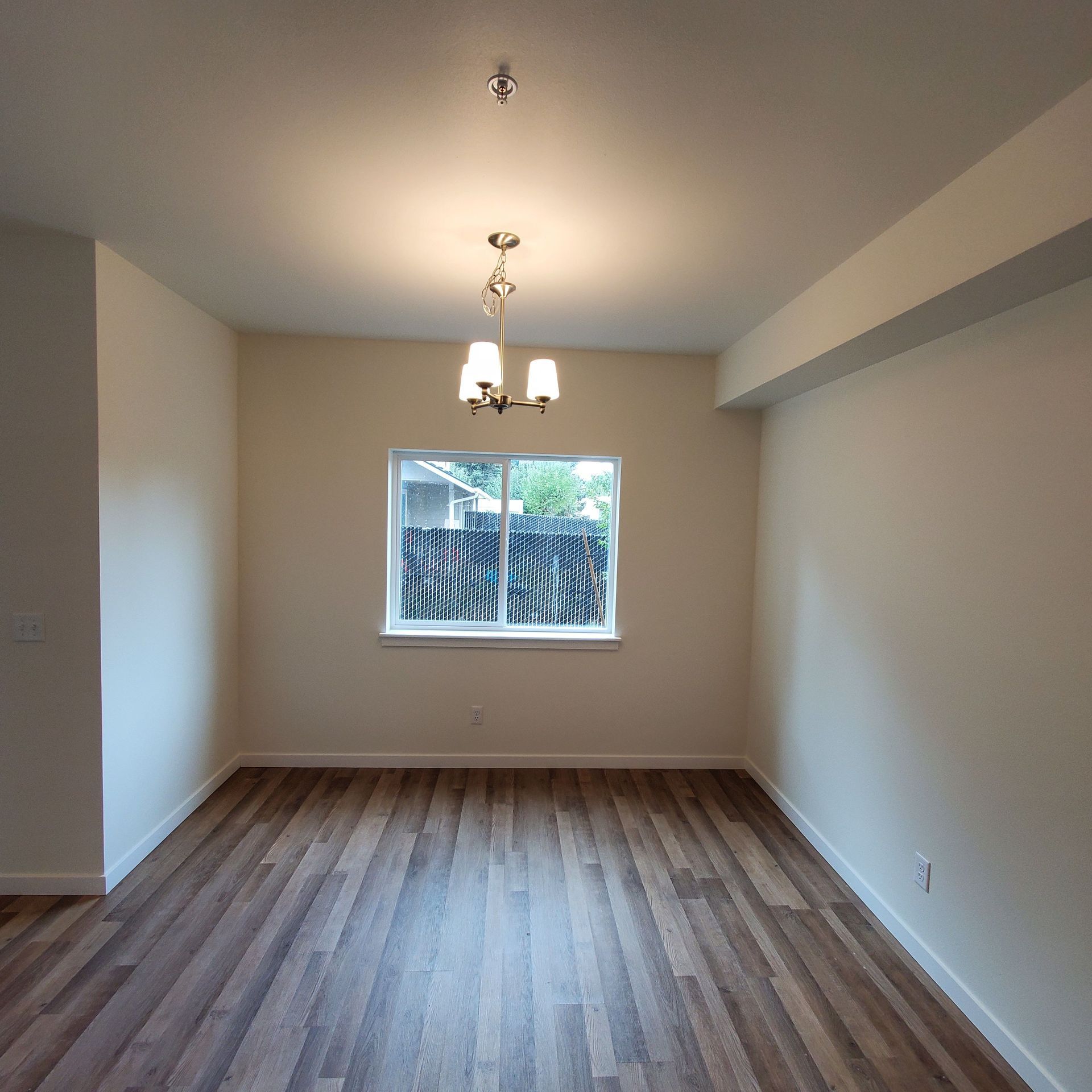 Oregon, near Western University of Health Sciences, one-bedroom one-bathroom –Living room back window.