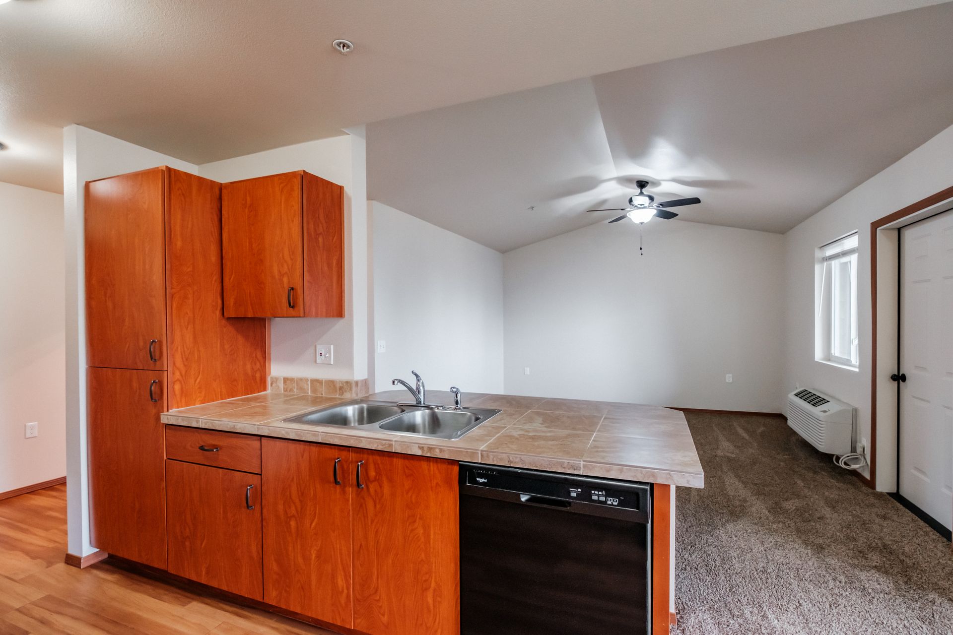 Aspen Place Apartments in Lebanon OR, near Western University of Health Sciences, two-bed two-bath – dishwasher, living room.