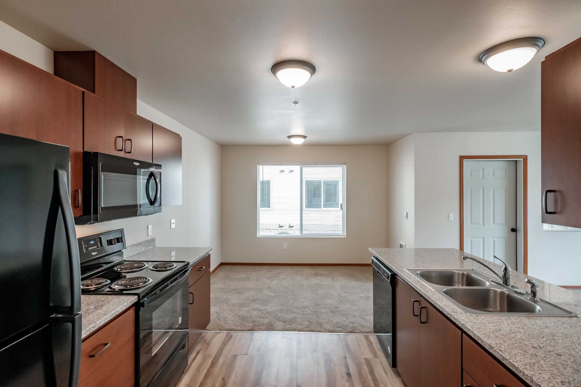 Oak Springs Apartments in Philomath Oregon, Near Oregon state University, two-bedroom two-bathroom – kitchen and living room.