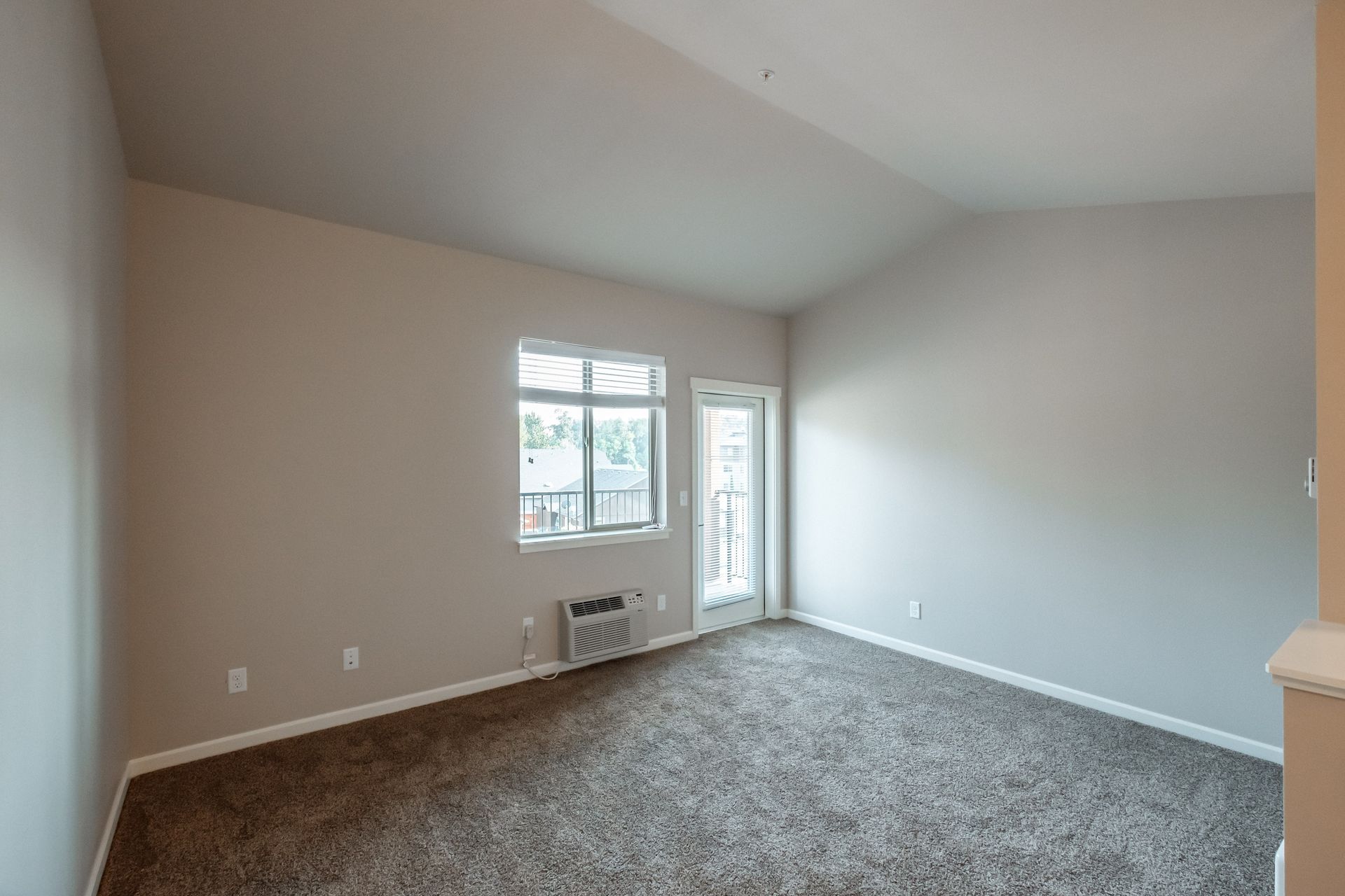 Hickory Hollow Apartments in North Albany OR, three-bedroom two-bathroom –living room, heater, air conditioner.