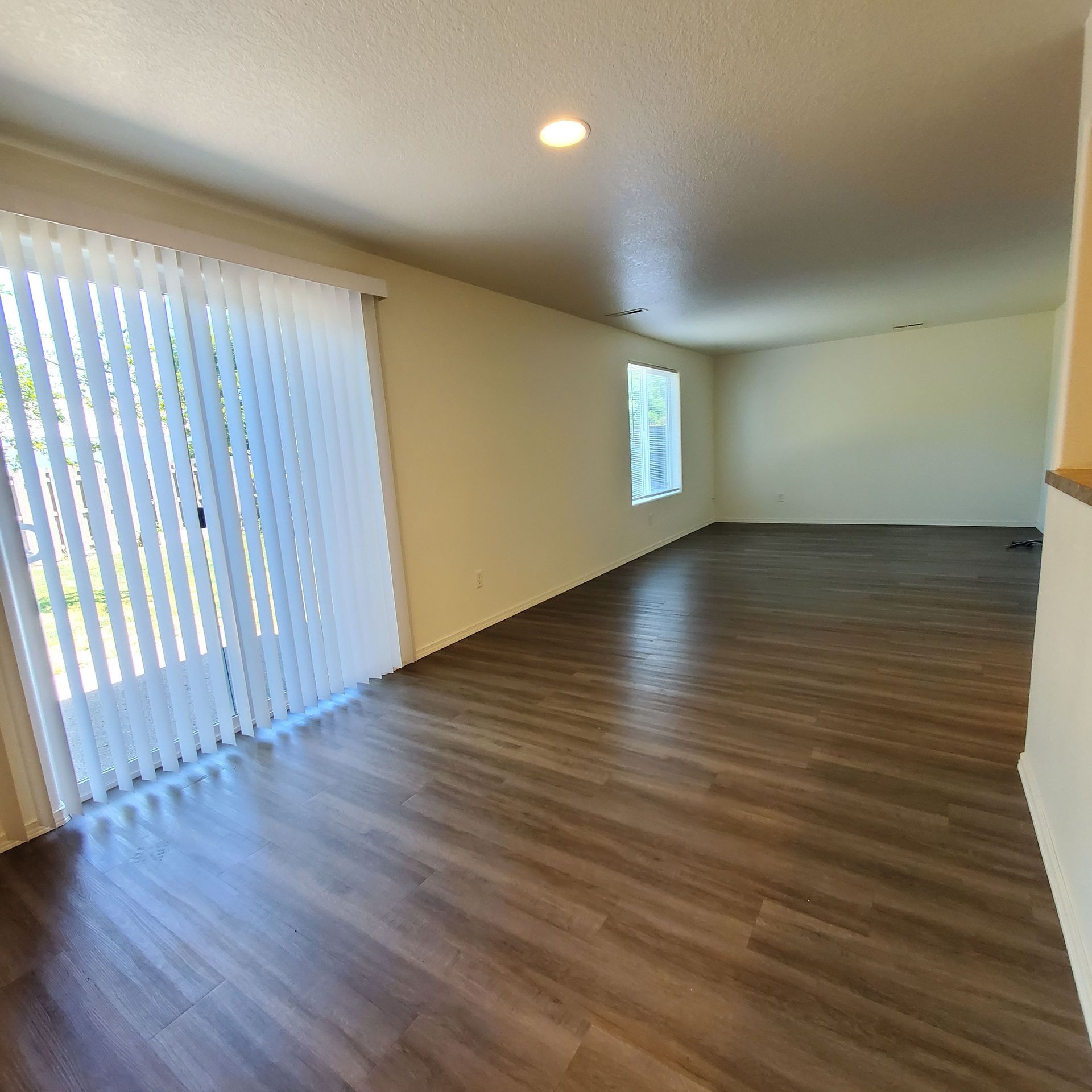 Meadowridge Townhomes in Monmouth Oregon, near Western Oregon University –living room and sliding glass door.