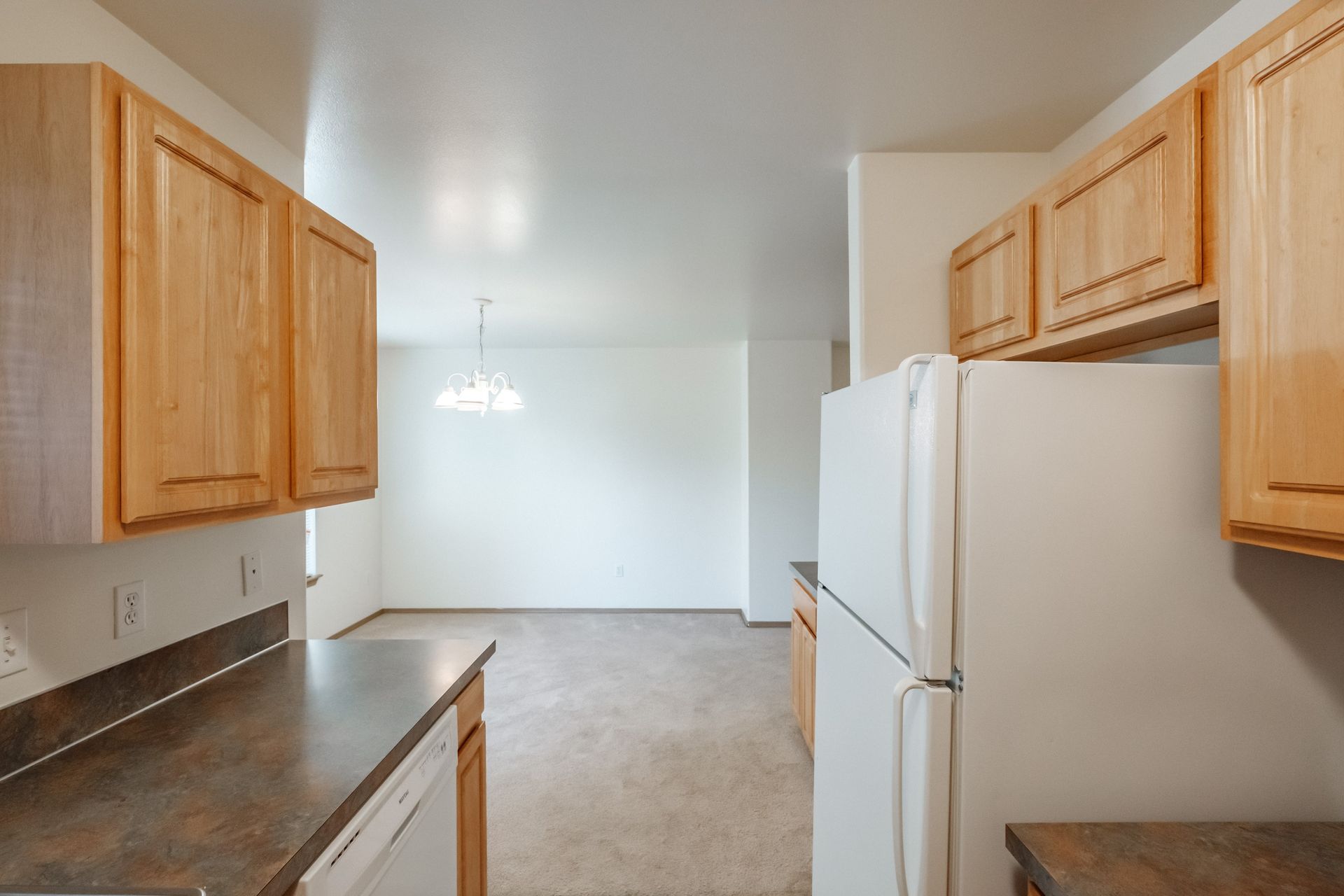 Mt. Vernon Town Homes – in Albany Oregon, two-bedroom two and ½ bathroom – cabinetry and fridge.