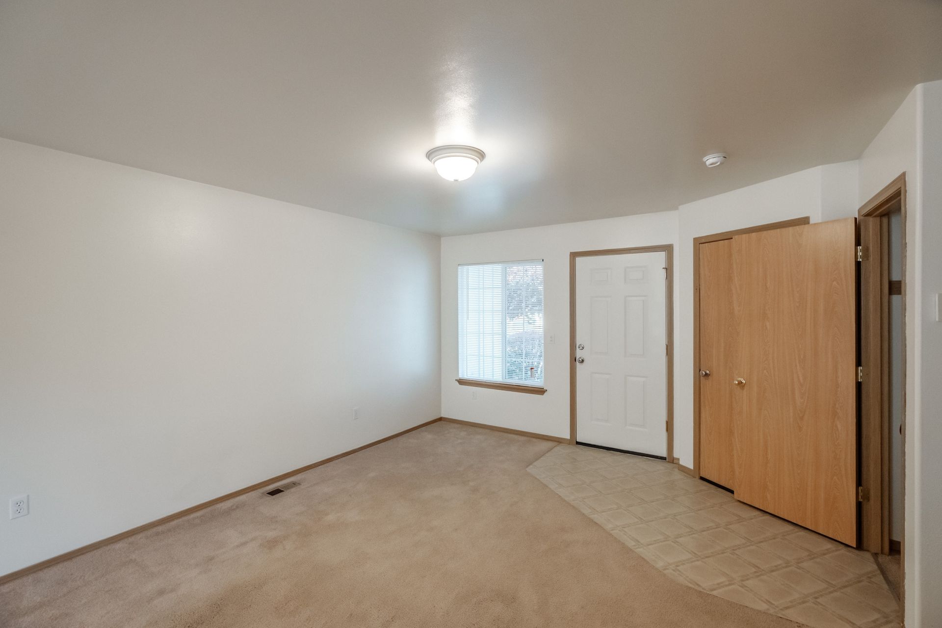 Mt. Vernon Town Homes – in Albany Oregon, two-bedroom two and ½ bathroom – front room and coat closet.