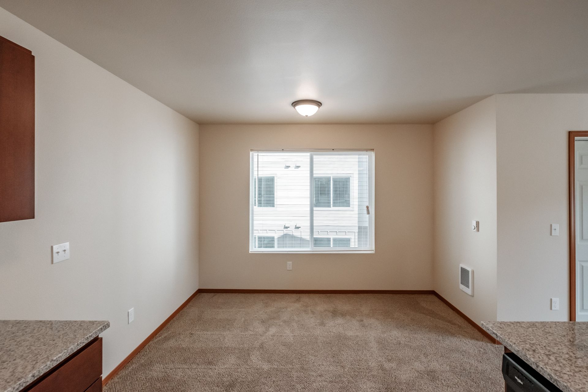 Oak Springs Apartments in Philomath Oregon, Near Oregon state University, two-bedroom two-bath– living room from kitchen.