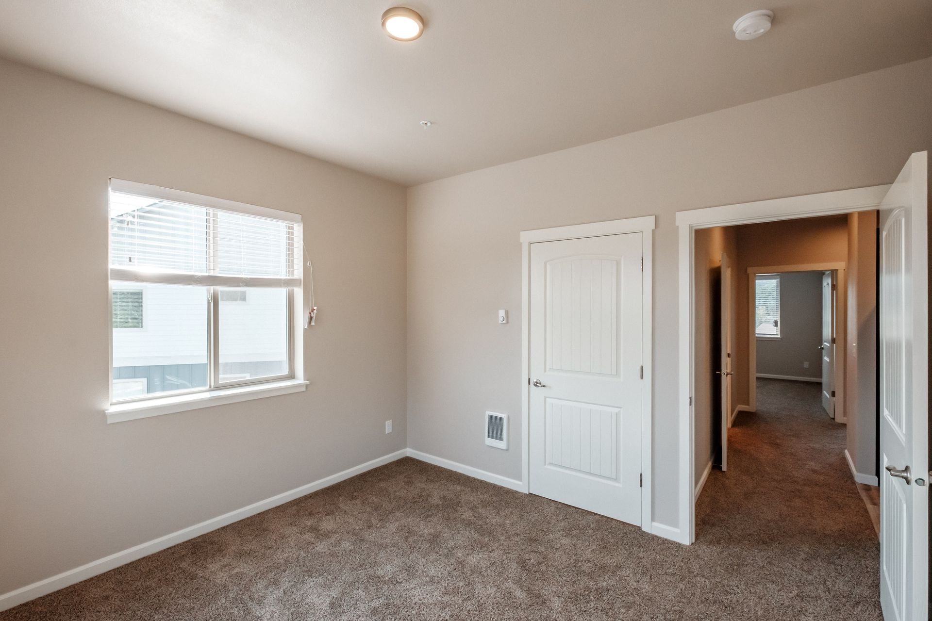 Hickory Hollow Apartments in North Albany OR, three-bedroom two-bathroom – master bedroom and closet -1.
