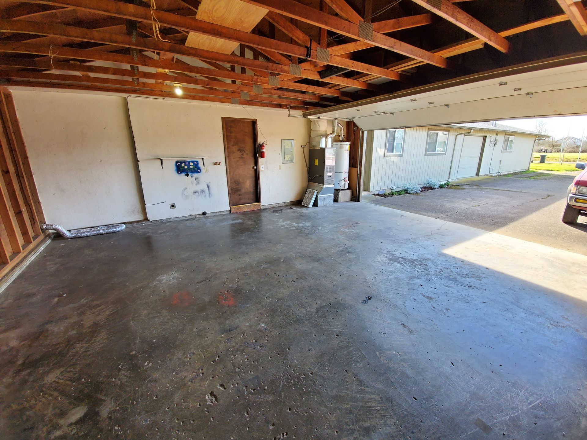 Amanda Lane Duplexes in Millersburg Oregon, three-bedroom two-bathroom – two car garage looking out.