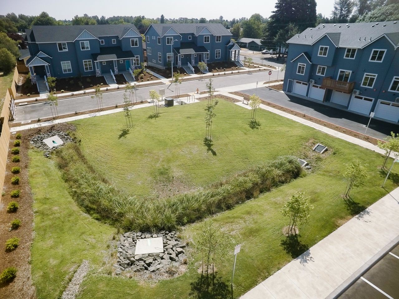 Goodnight Townhomes in Corvallis, OR, Near Oregon State University – aerial apartment community greenspace view.
