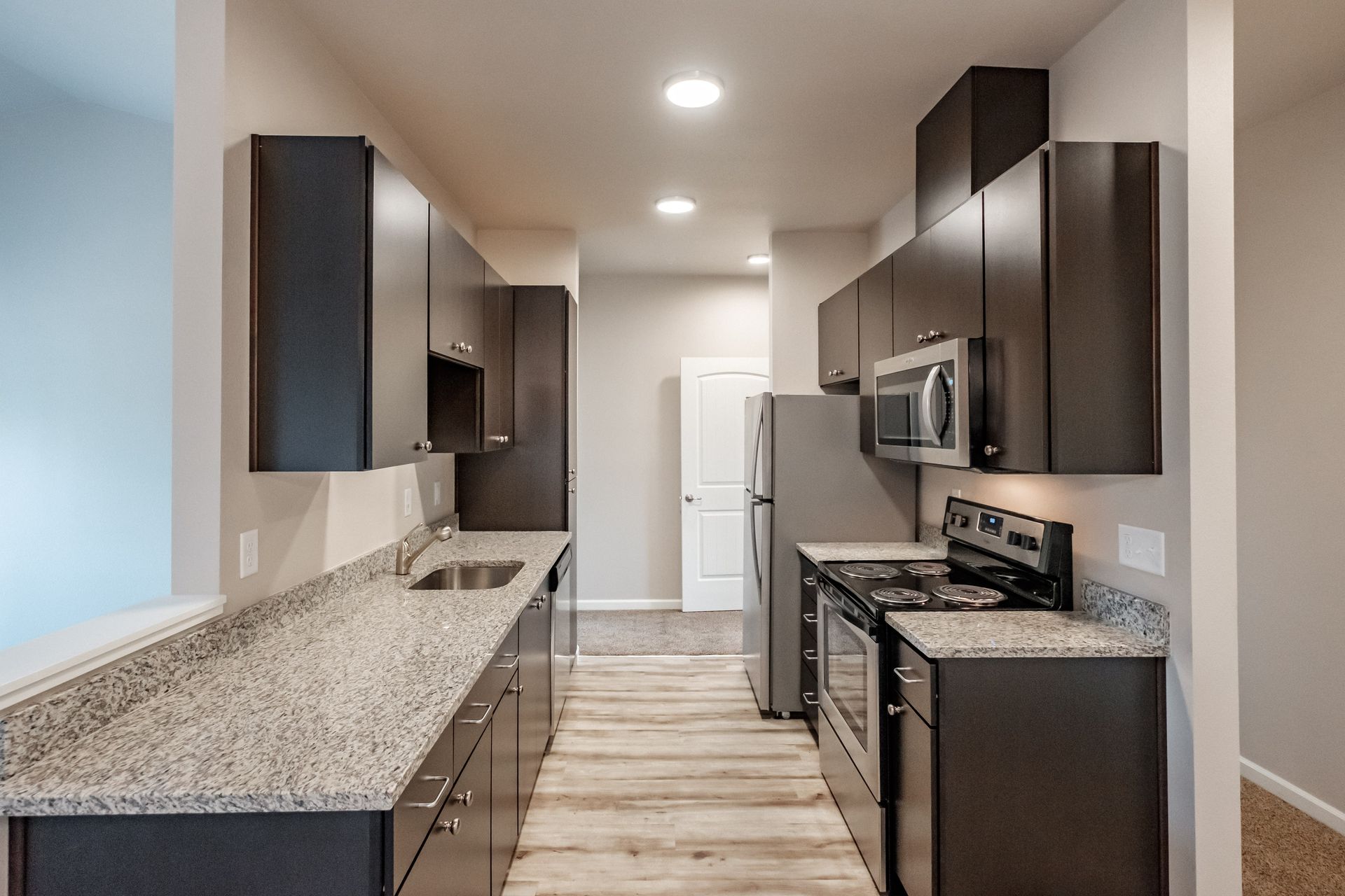 Hickory Hollow Apartments in North Albany OR, three-bedroom two-bathroom –kitchen.