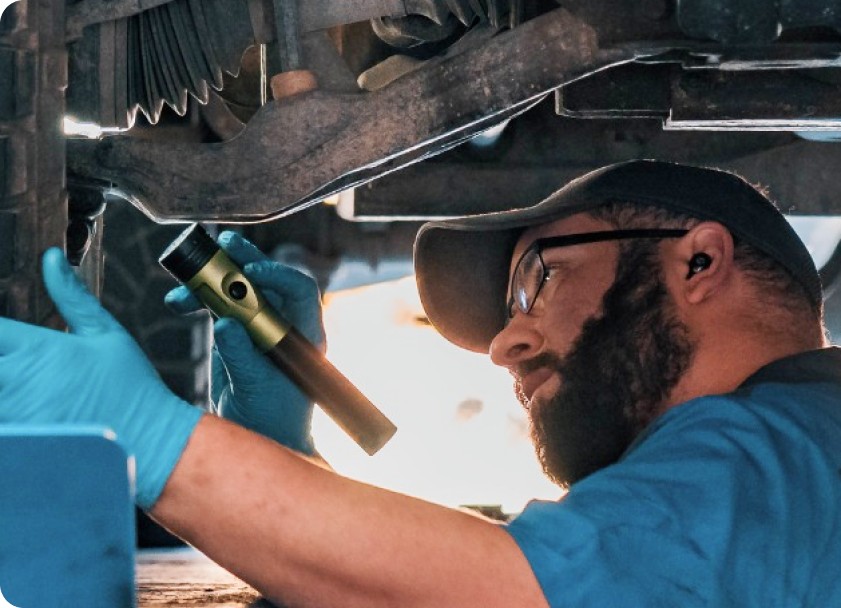 One of our trustworthy mechanics inspecting a vehicle | Modern Mechanics