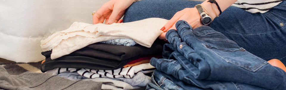 Woman with Clothing Pile