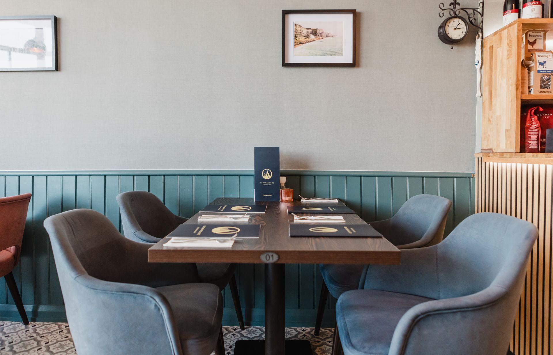 A table in a restaurant with a menu on it