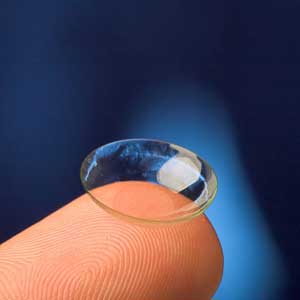 soft contact-lens in a finger