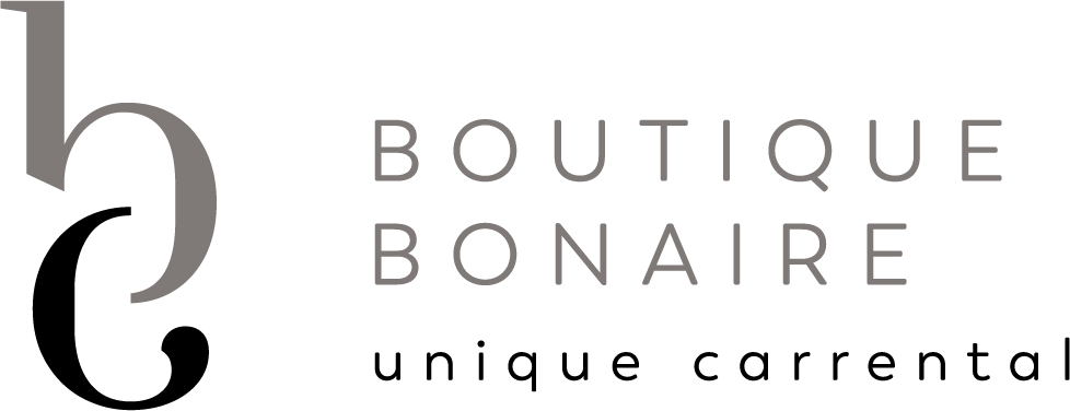 A logo for boutique bonaire , a unique car rental company.