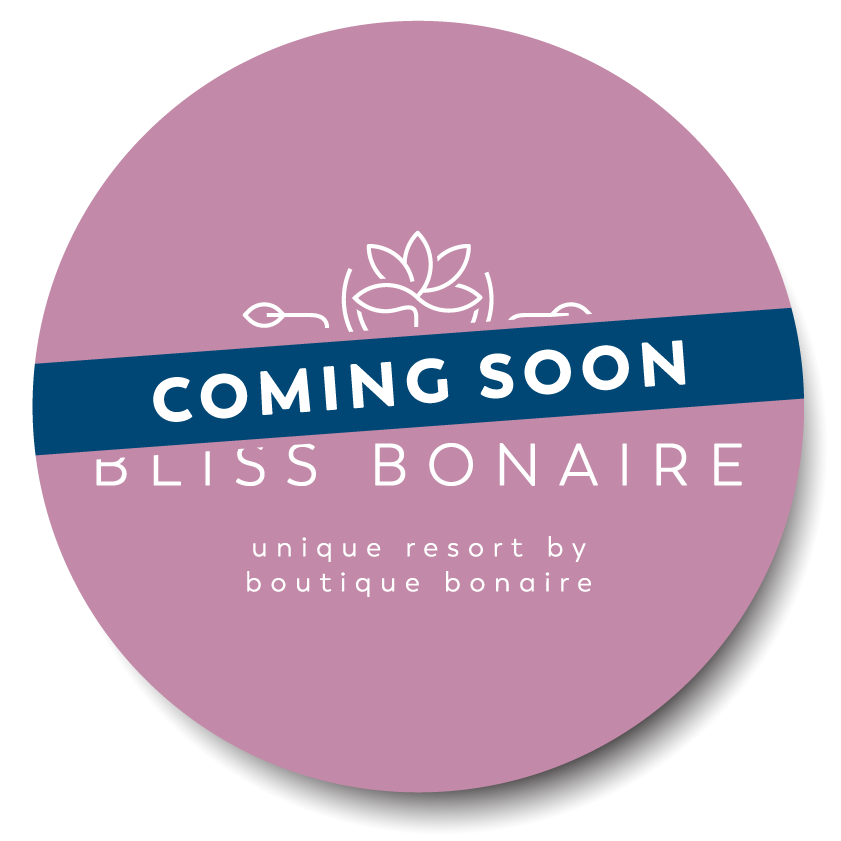 A purple circle with the words coming soon bliss bonaire on it