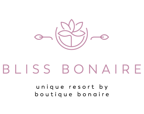 A logo for bliss bonaire , a unique resort by boutique bonaire.