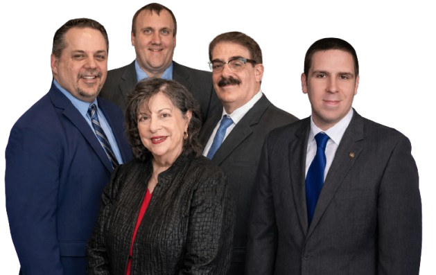 Five professionals in business attire posed against a white background.