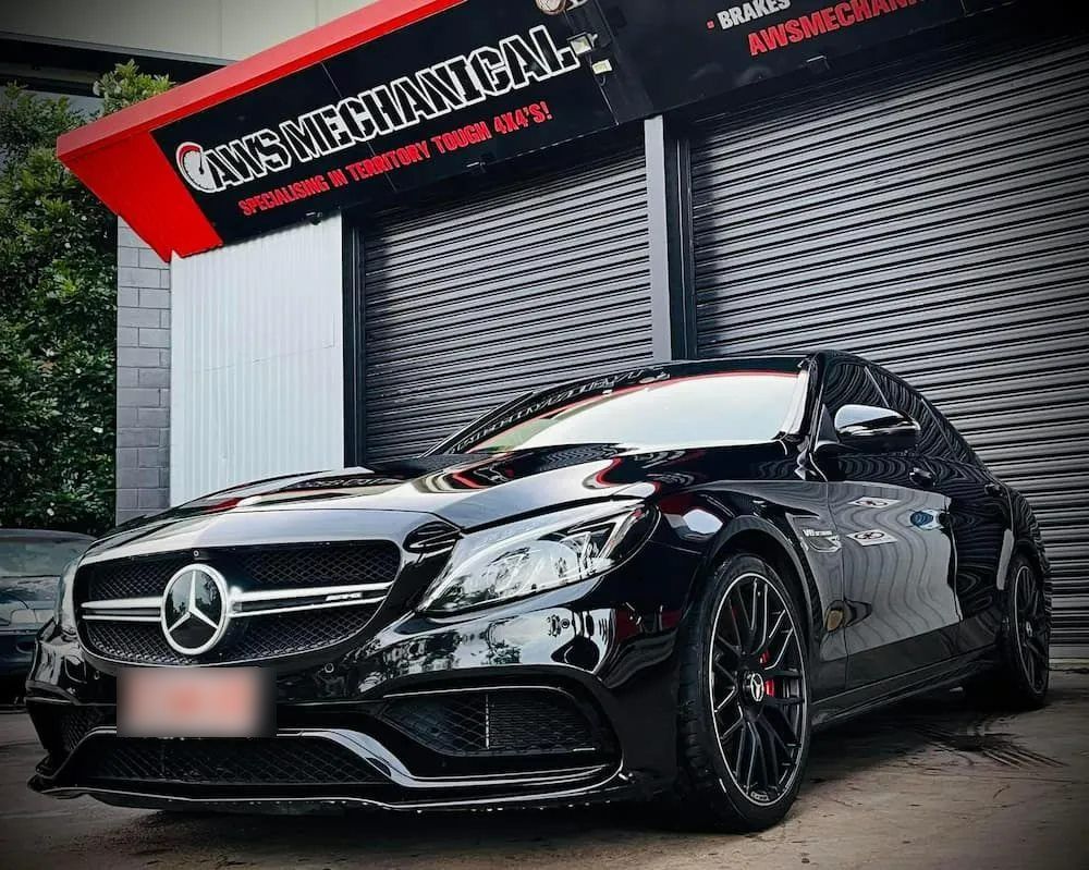 A Black Mercedes Benz is Parked in Front of a Building — AWS Mechanical in Stuart Park, NT
