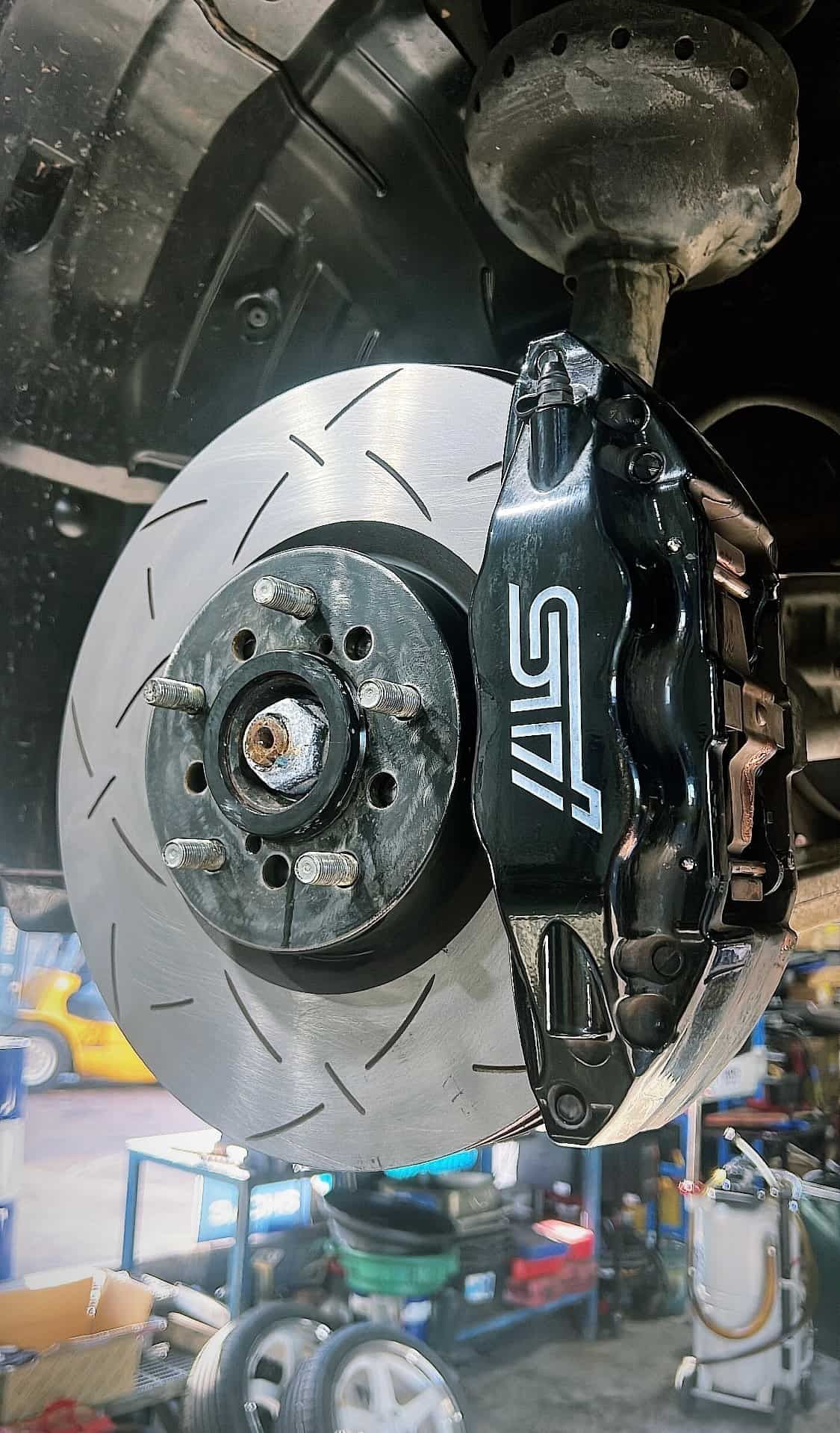 A Close Up of a Brake Disc on a Car in a Garage  — AWS Mechanical in Stuart Park, NT
