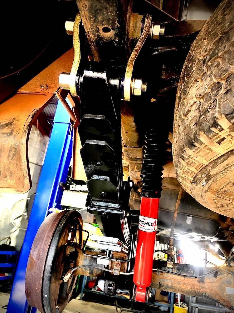 The Engine of a Car is Visible Under the Hood — AWS Mechanical in Stuart Park, NT