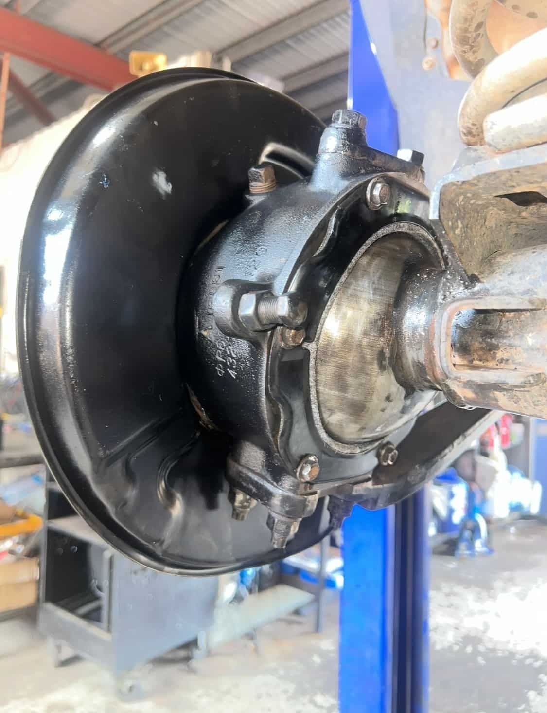 A Close Up of a Brake Disc on a Car on a Lift — AWS Mechanical in Stuart Park, NT