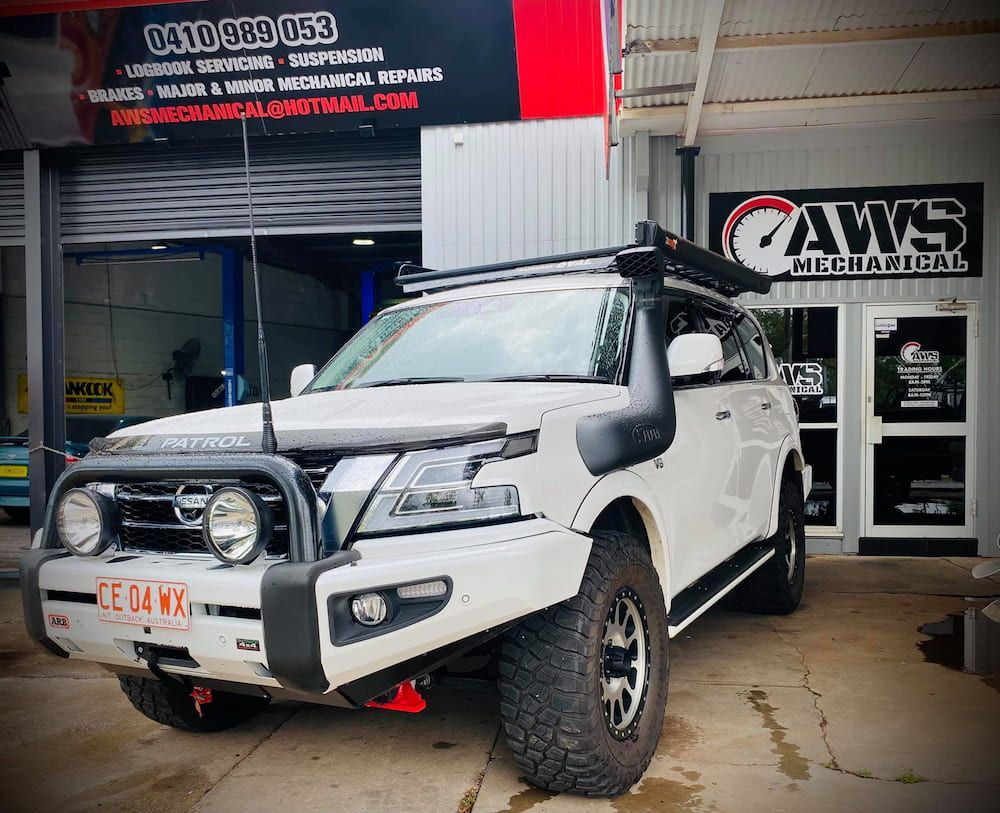 A White Ute parked outside a Mechanic — AWS Mechanical in Stuart Park, NT
