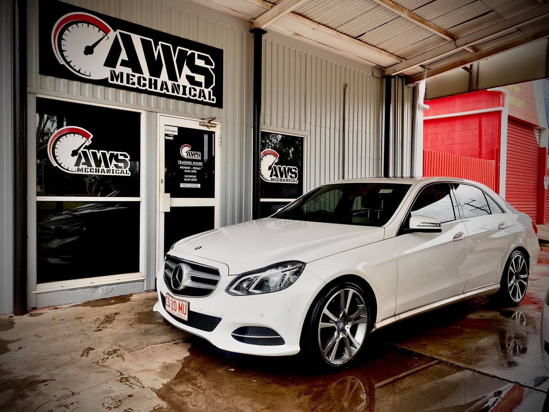 A car waiting outside the Front of a Mechanic  — AWS Mechanical in Stuart Park, NT