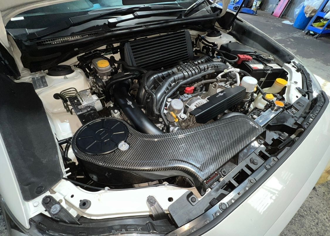 A Car has its hood open and the engine is showing — AWS Mechanical in Stuart Park, NT