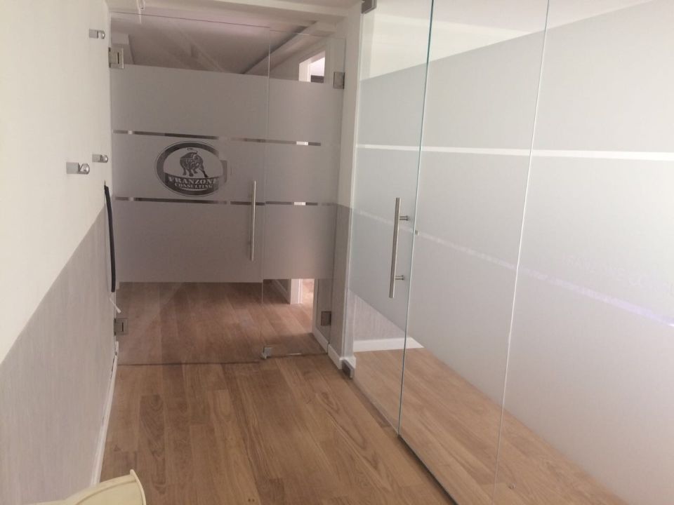 porte a battente in vetro