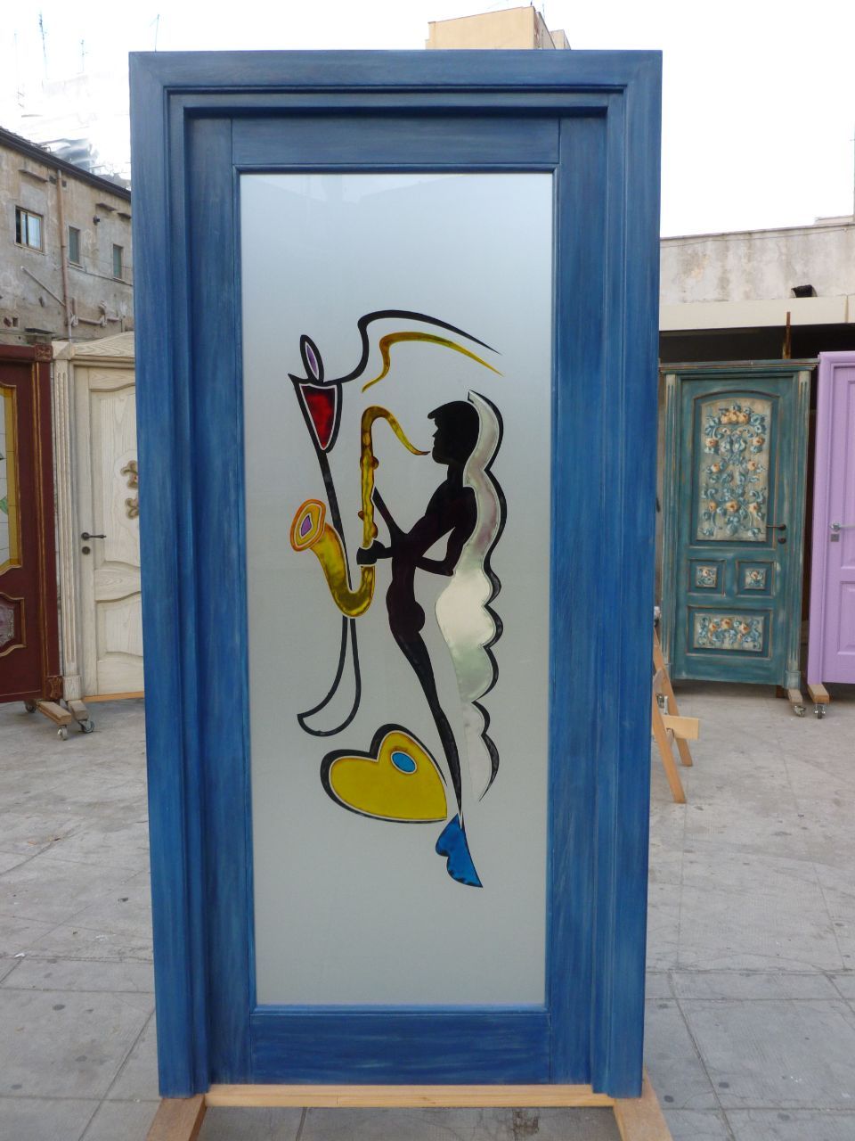 sassofonista inciso su vetro