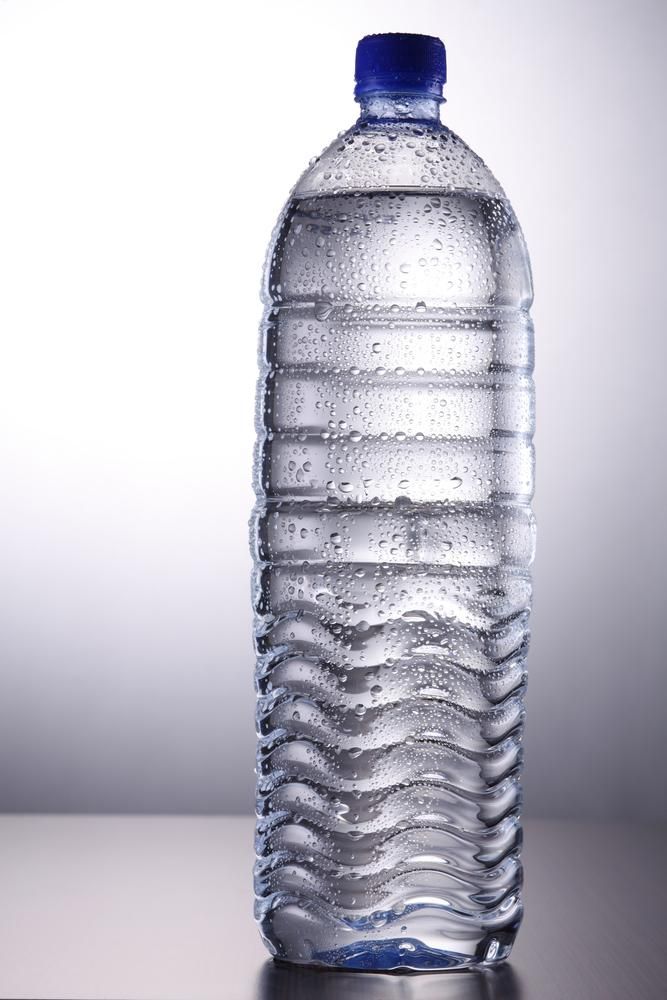 Water Bottle, Clear Plastic, Blue Cap, Droplets of Condensation on the Exterior — Port Macquarie Pure Water In Taree, NSW