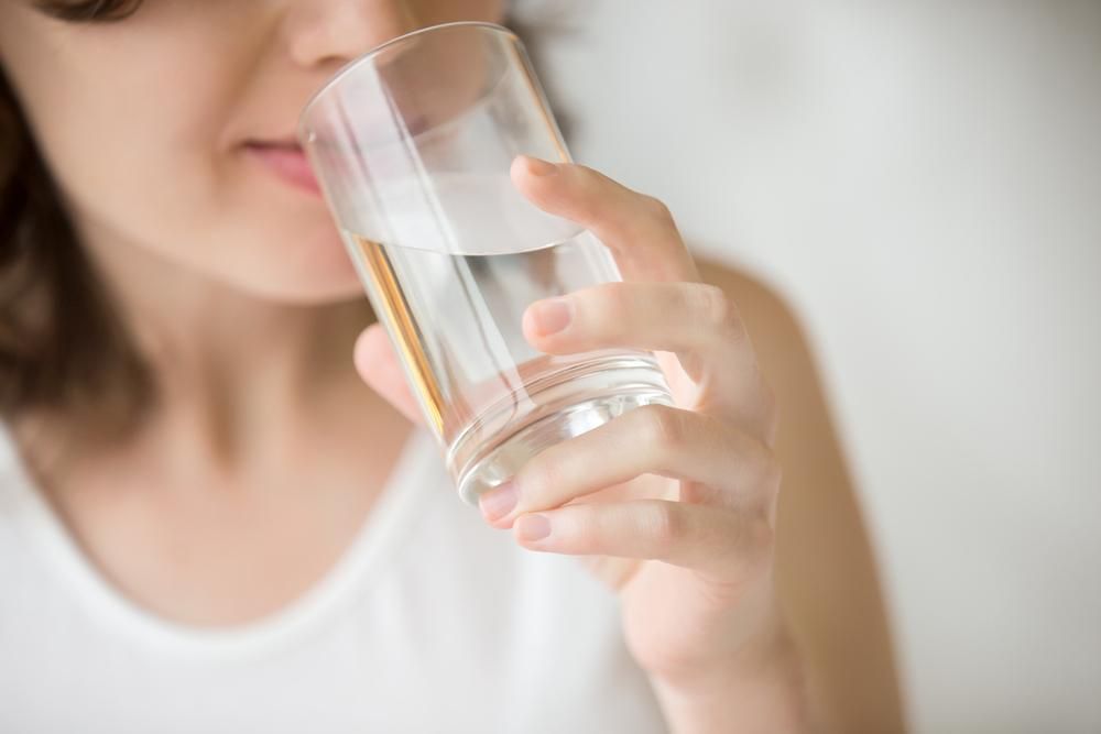 Woman Drinking Water From a Glass — Port Macquarie Pure Water In Wauchope, NSW