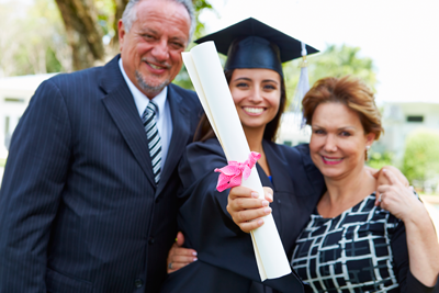 happy parents with college graduate
