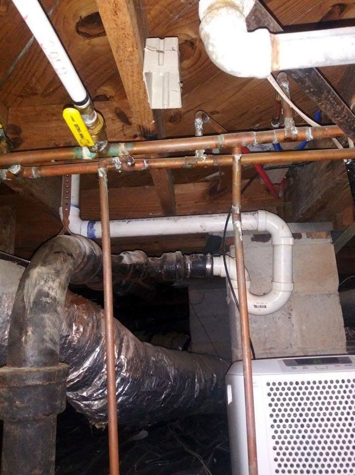 Bunch of Pipes in Basement — Monroe, GA — Right Price Plumbing and Septic