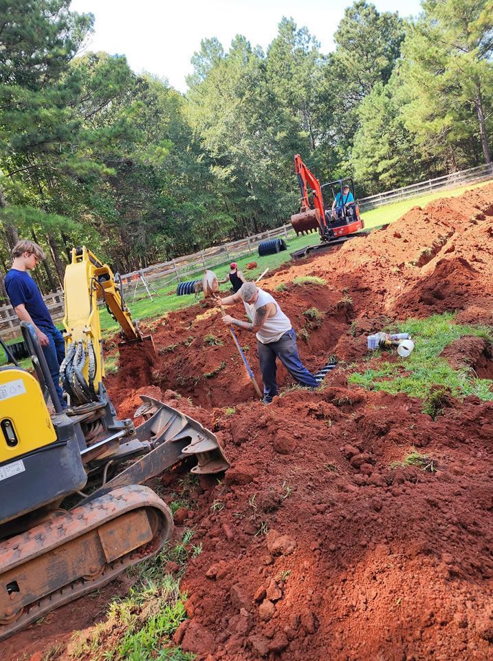 Workers Digging in a Wide Property — Monroe, GA — Right Price Plumbing and Septic