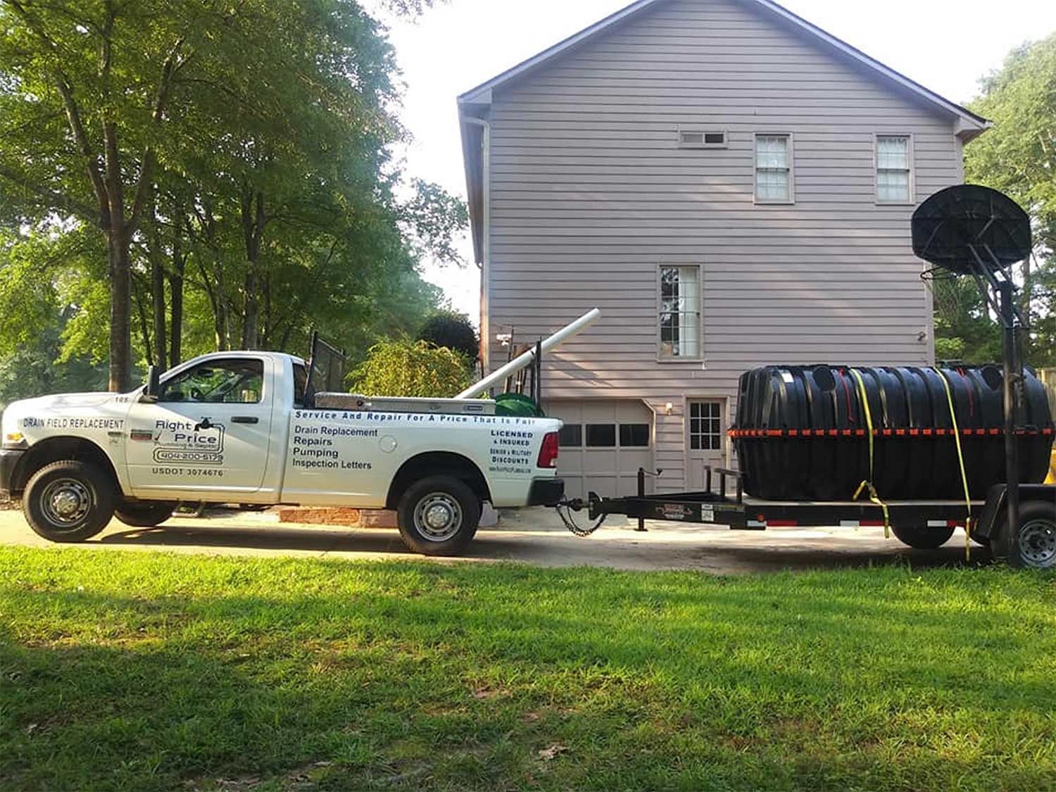 Trailer Loaded with Septic Tank — Monroe, GA — Right Price Plumbing and Septic
