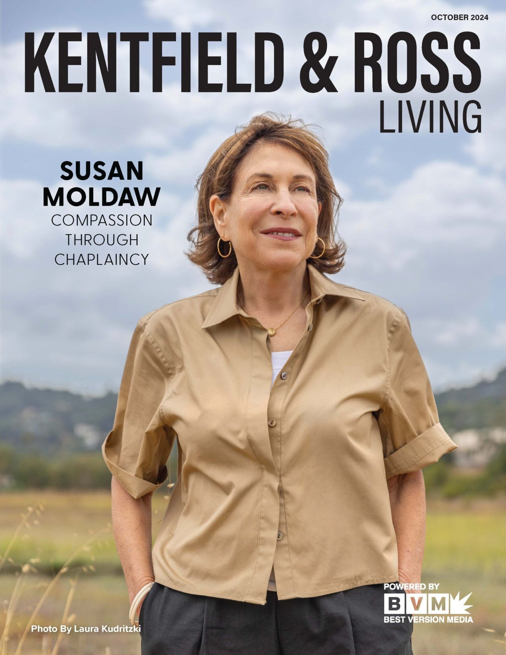 Magazine cover featuring Susan Moldaw standing outdoors in a tan shirt against a backdrop of hills and a cloudy sky.