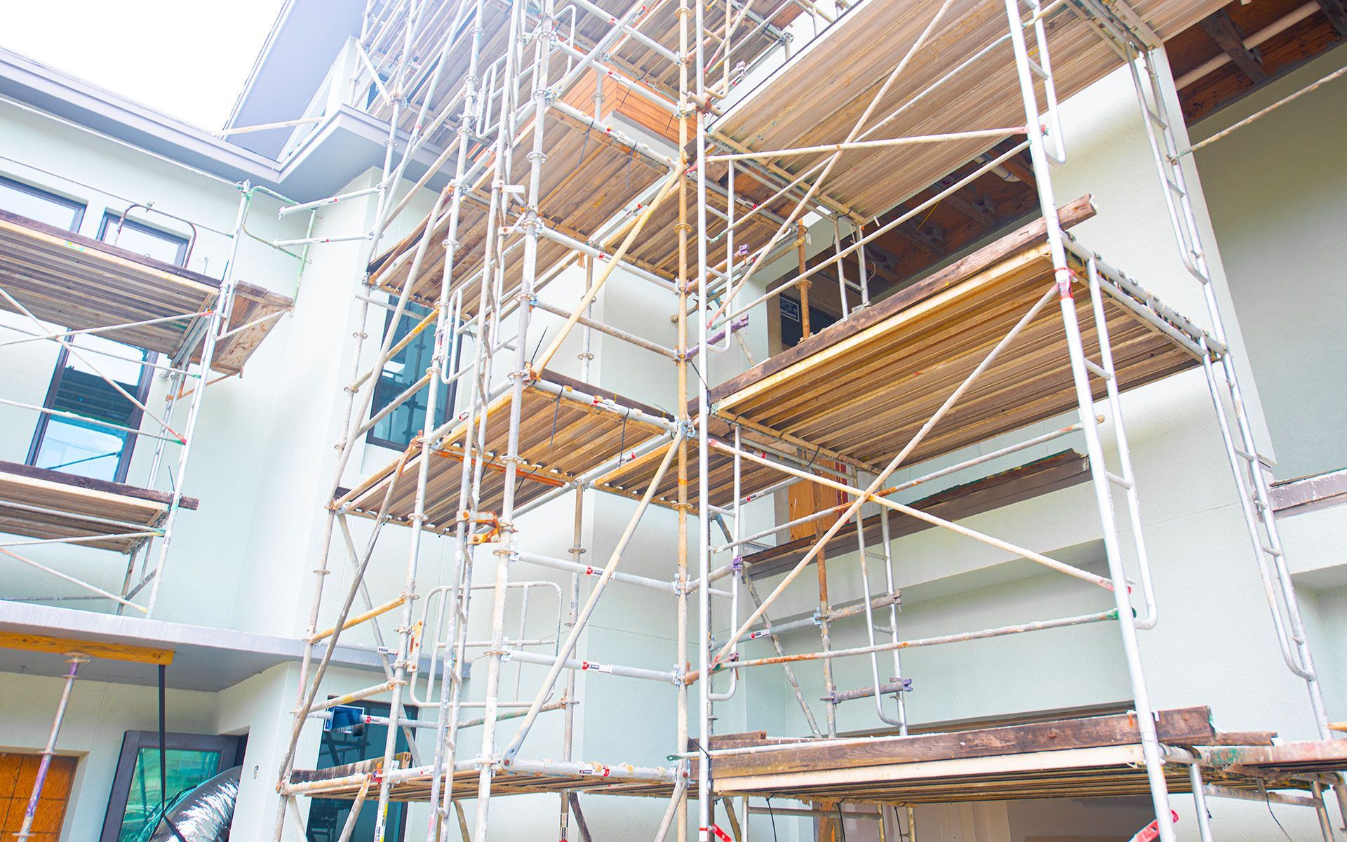 A building is being built with scaffolding around it.