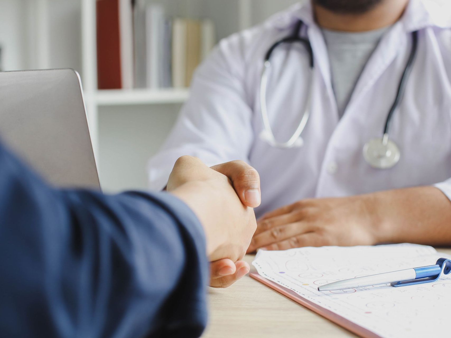 Doctor shaking patient's hand