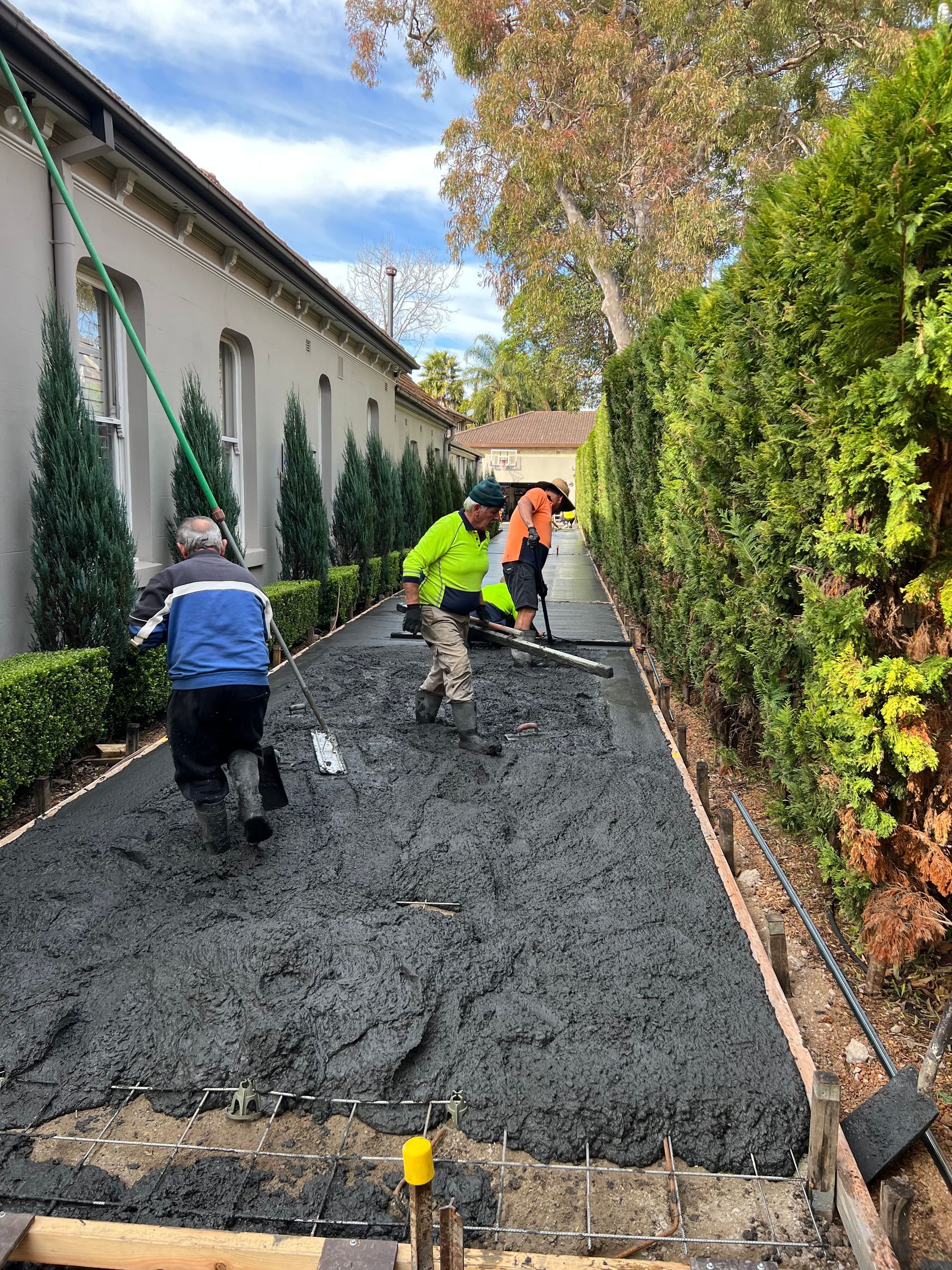 A House Is Being Built In A Residential Area With A Concrete Foundation – Concord and the Inner West - Grenic Construction Group Pty Ltd