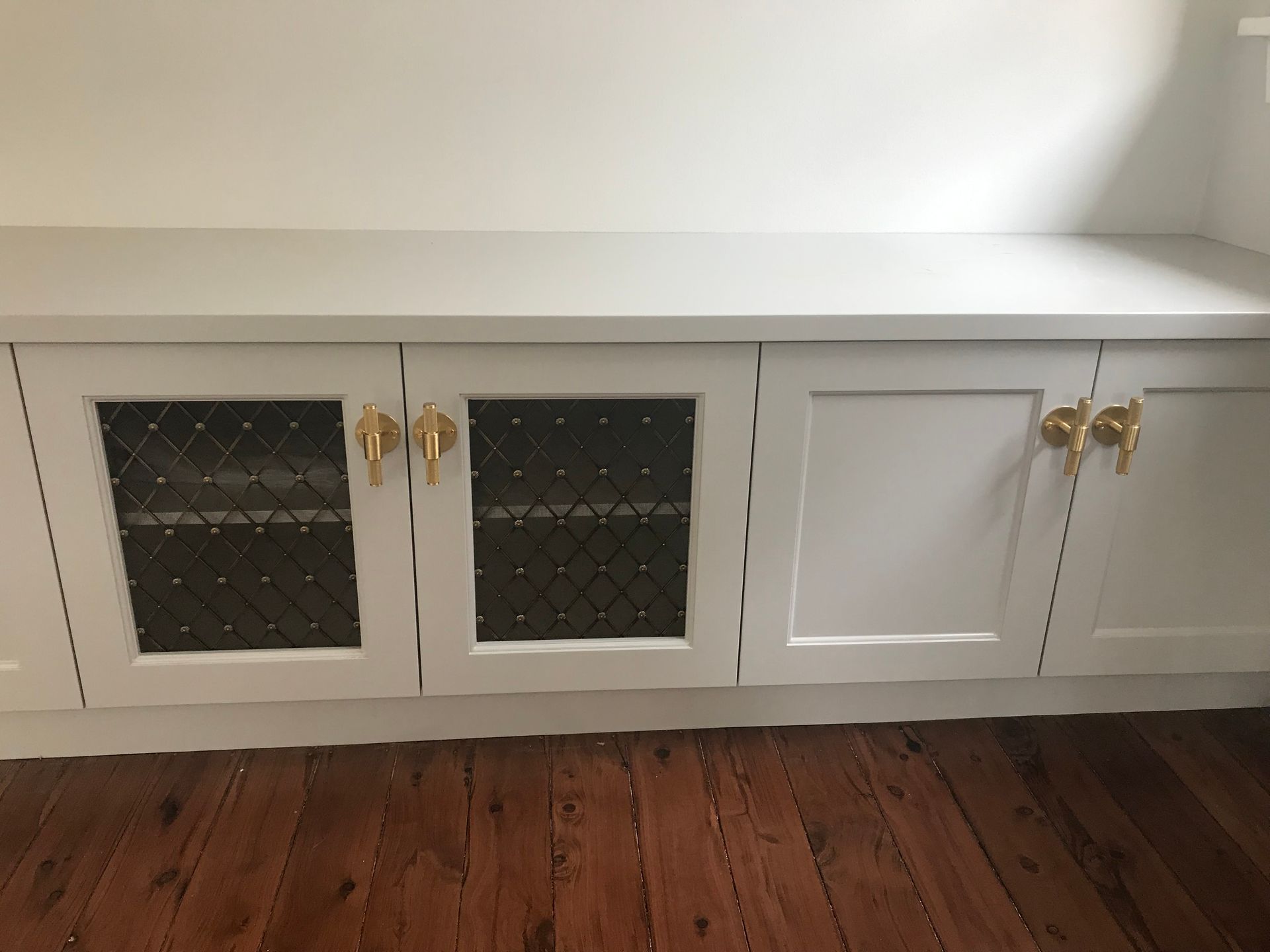 White Cabinet With Golden Handle – Concord and the Inner West - Grenic Construction Group Pty Ltd