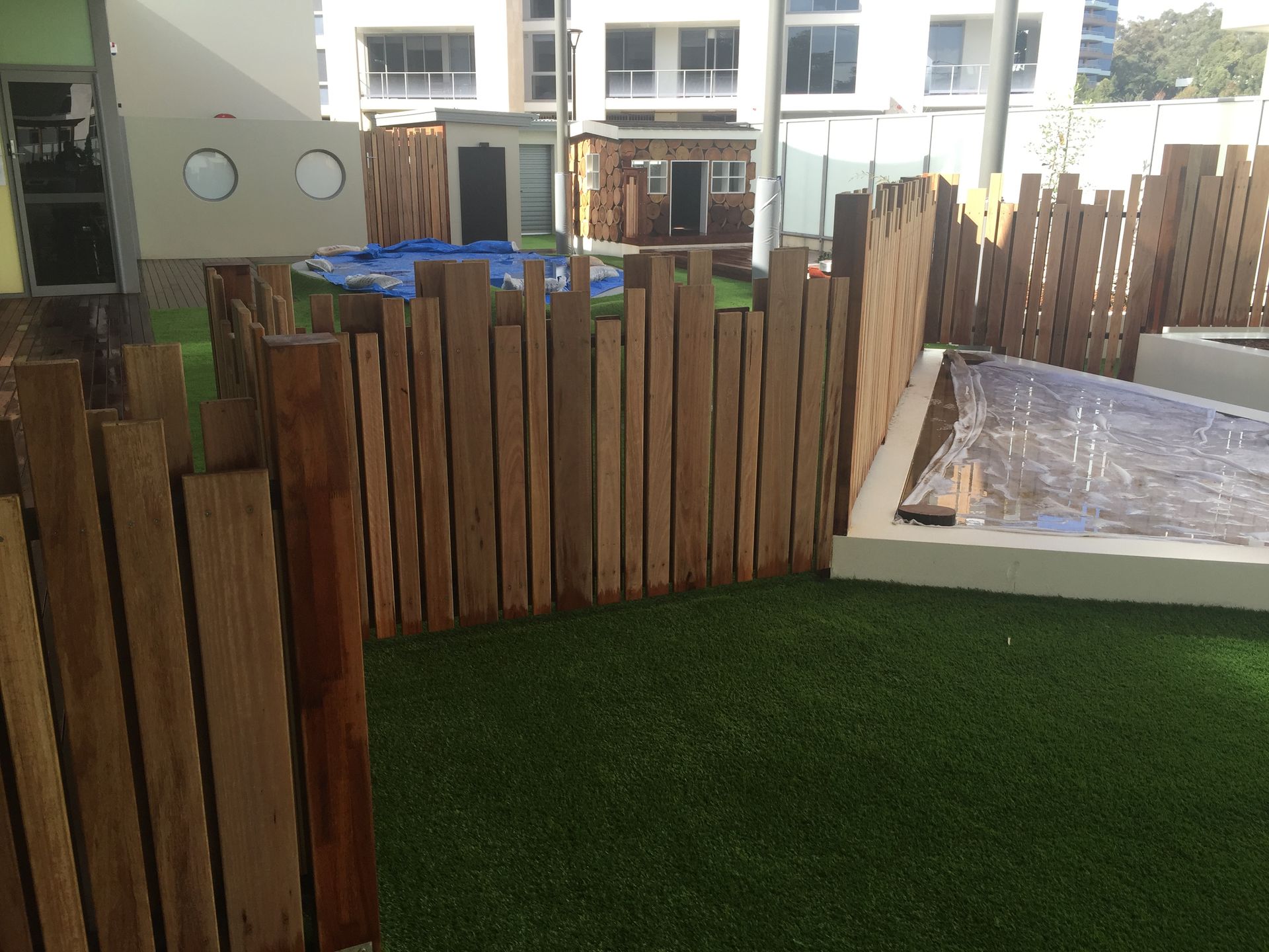 Wooden Fence With Lawn Grass – Concord and the Inner West - Grenic Construction Group Pty Ltd