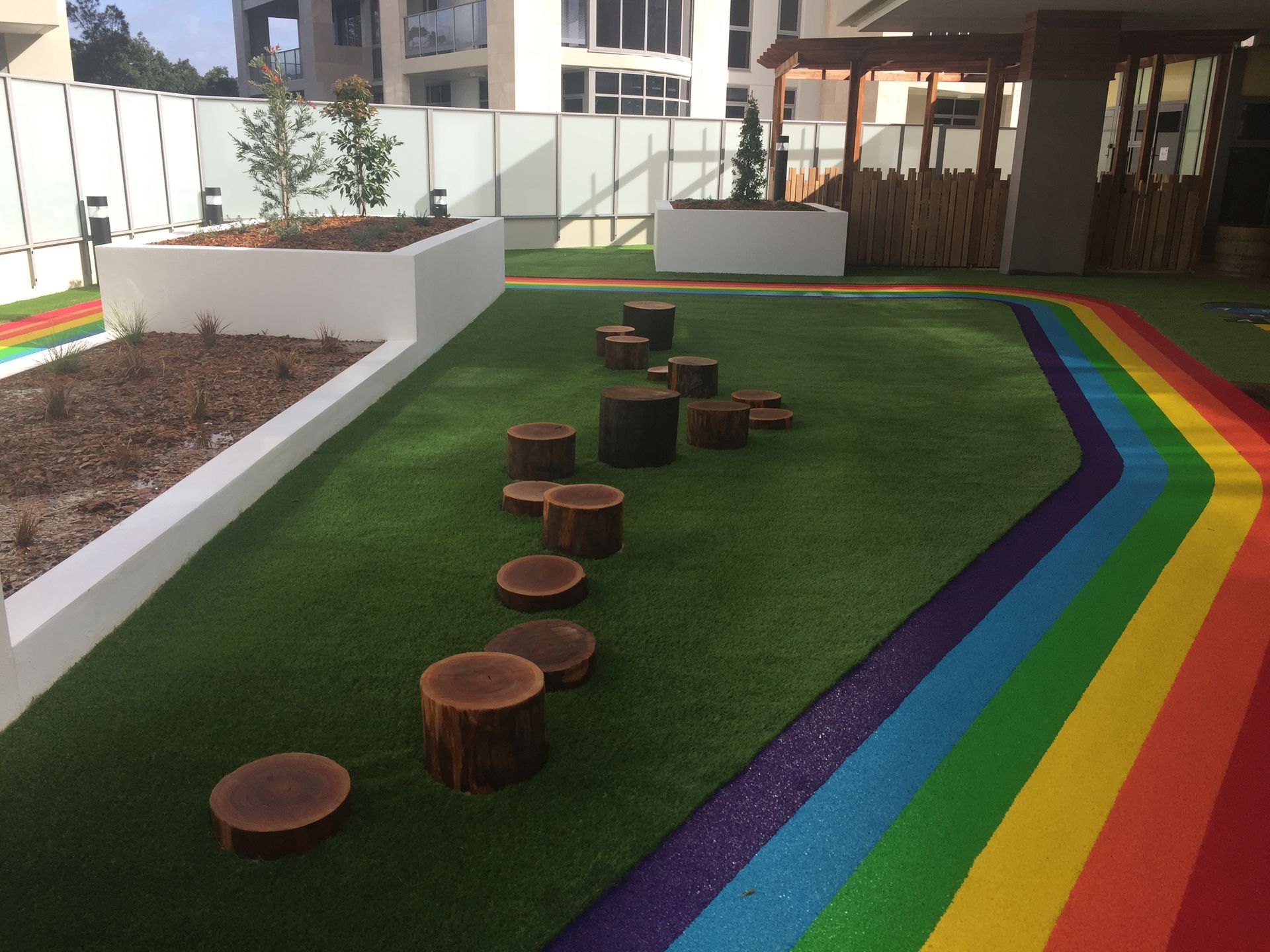 Rainbow With Logs – Concord and the Inner West - Grenic Construction Group Pty Ltd
